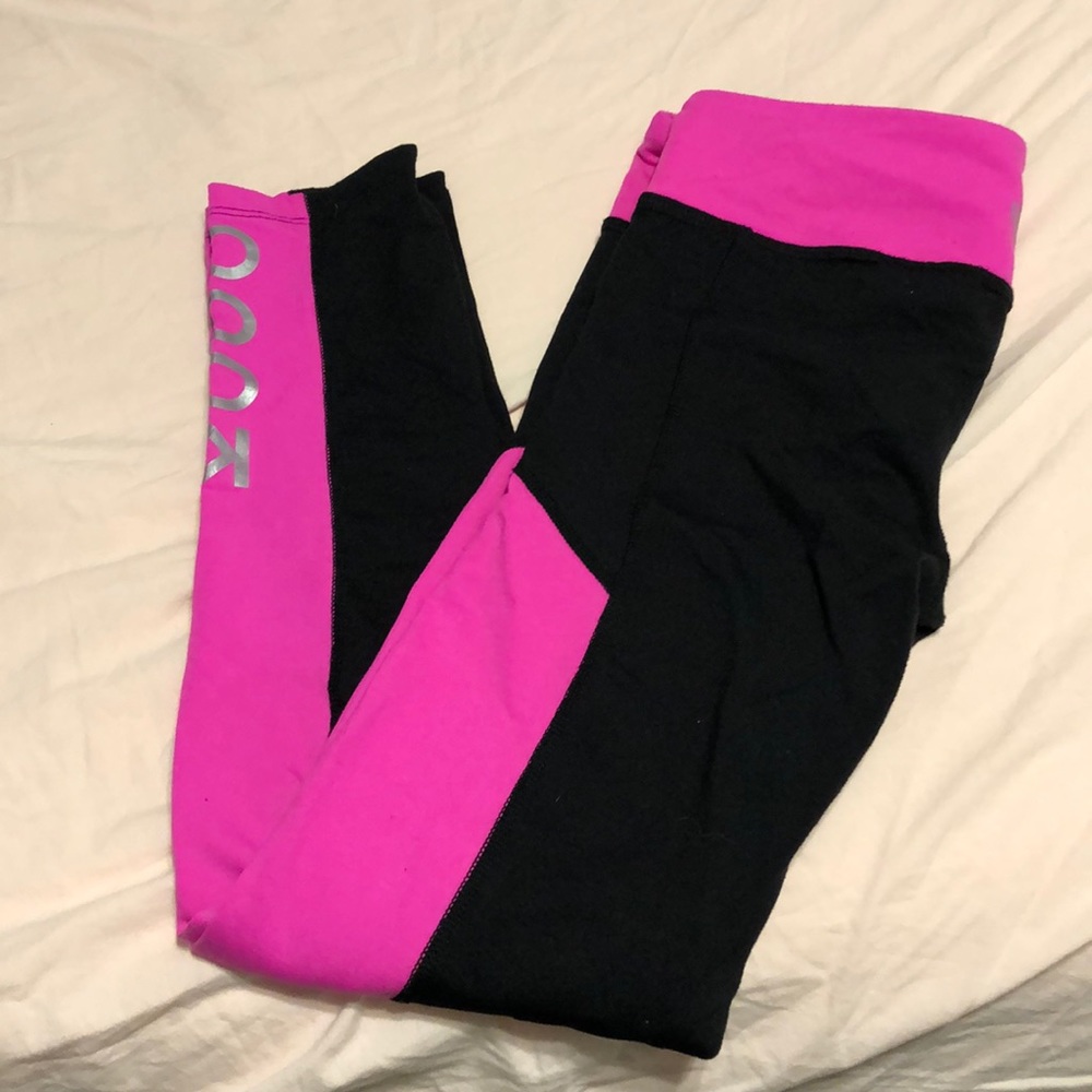 Chive workout bottoms and sports bra.